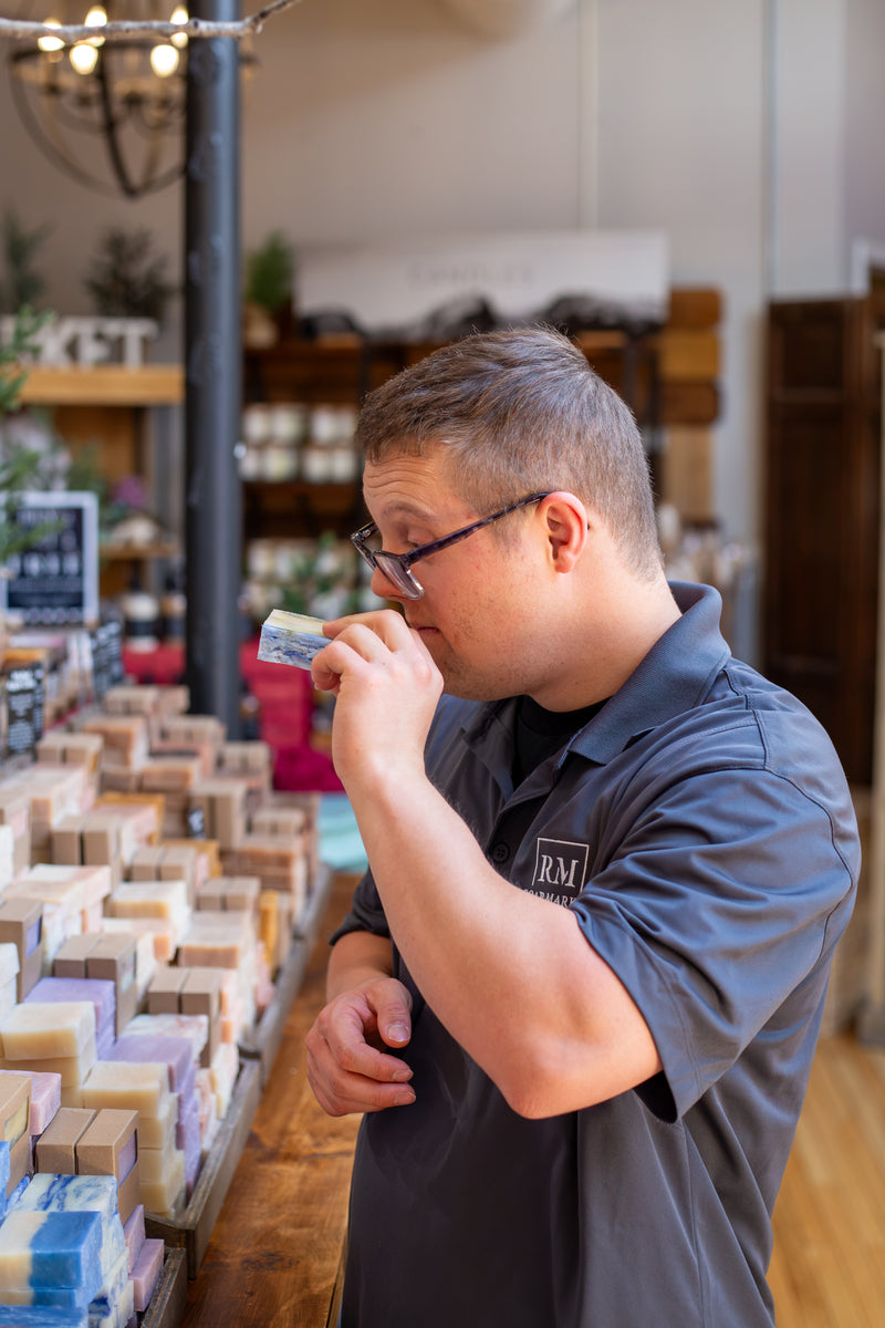 mySTORY affiliate John holding a bar of Story by RM soap